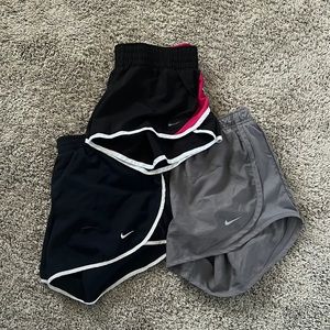 3 pairs of Nike running shorts